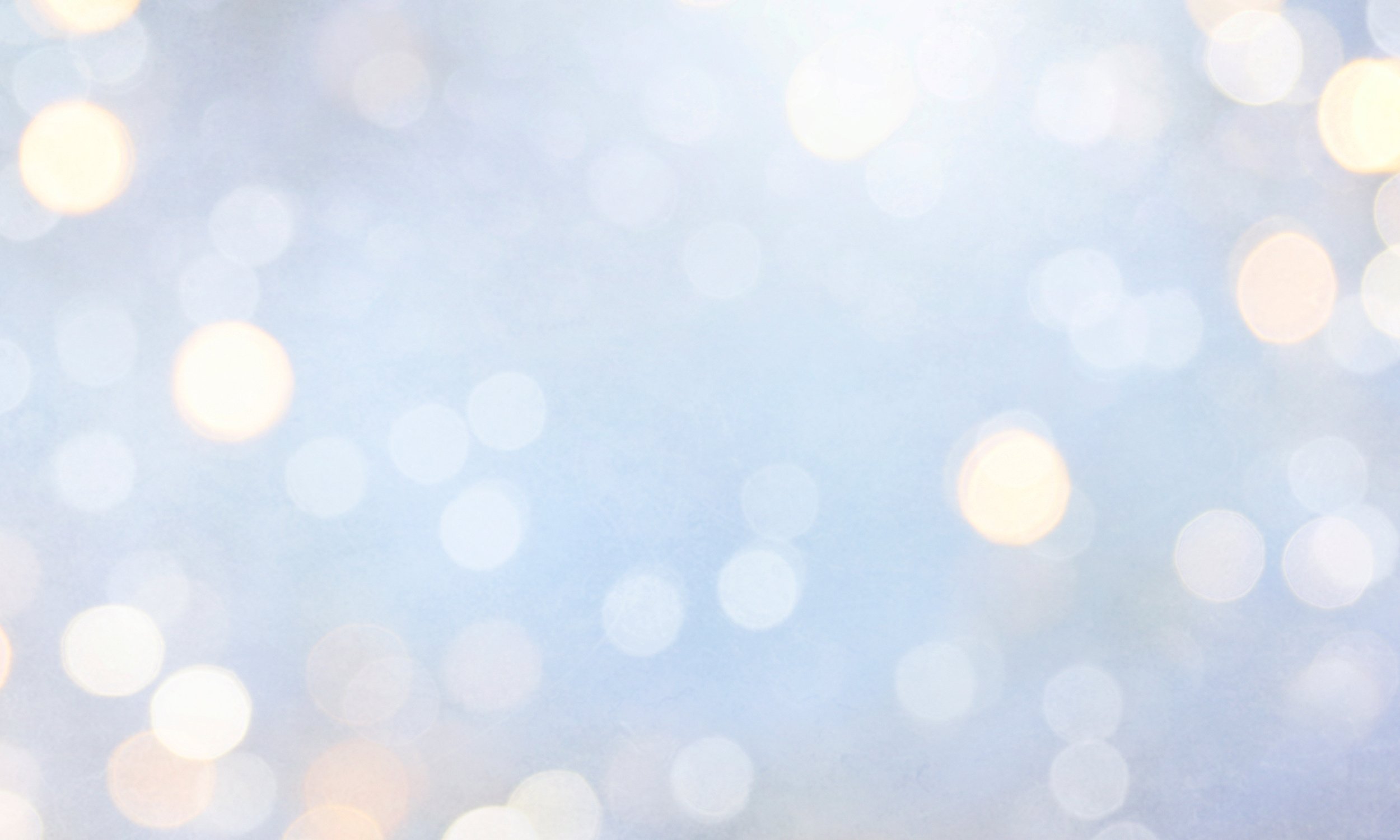 Christmas light background.  Holiday glowing backdrop. Defocused Background With Blinking Stars. Blurred Bokeh.